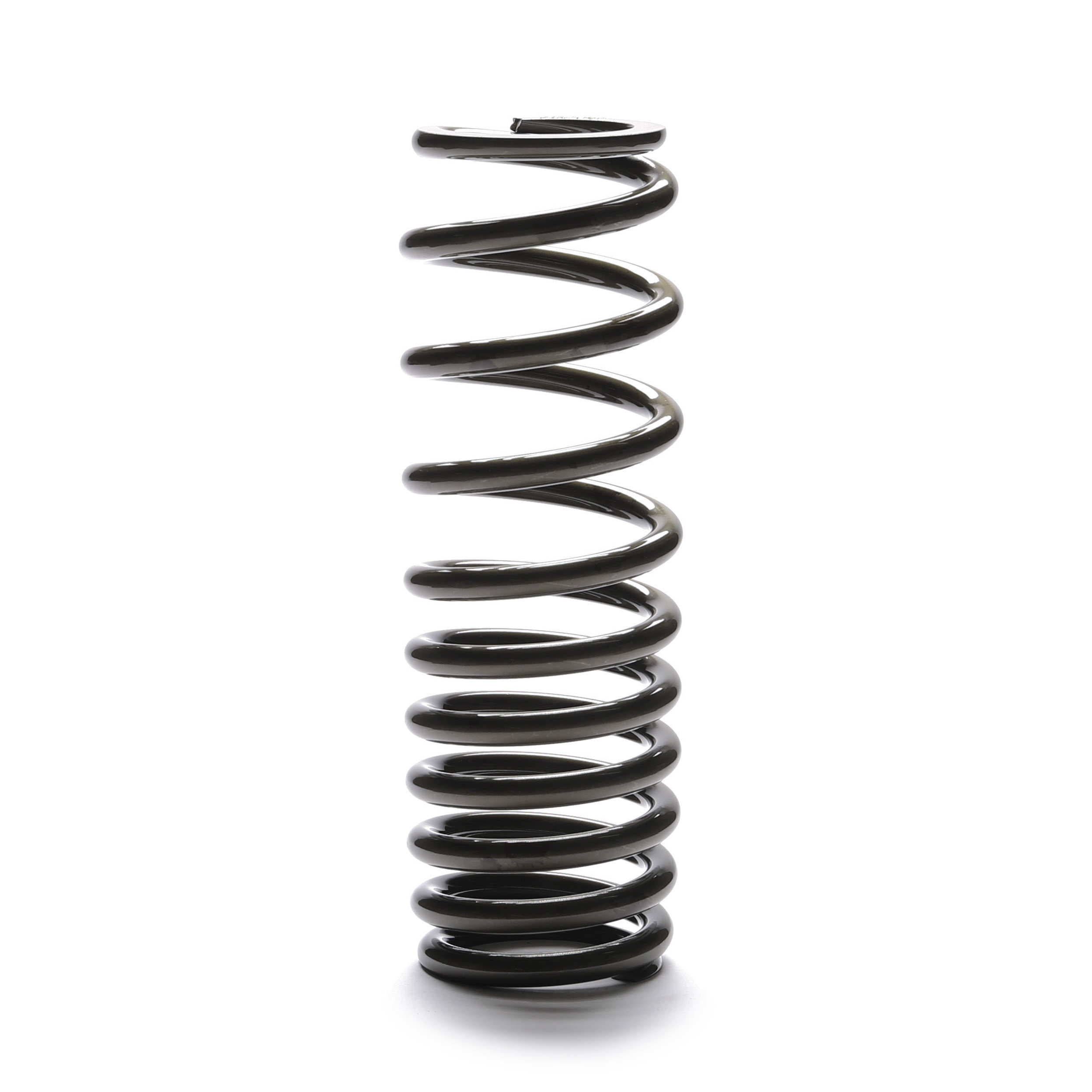Black colored progressive coil over spring standing on end