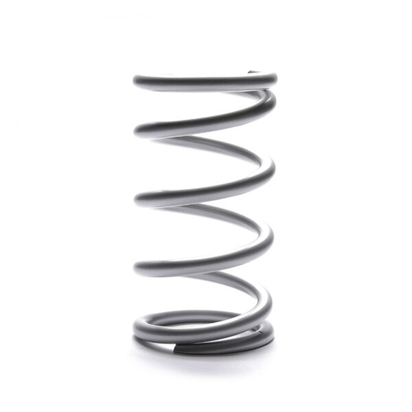 Silver coil spring used on oval track race cars shown not installed and standing on end. An example of Dirt Modified Springs and Stock Car Springs.